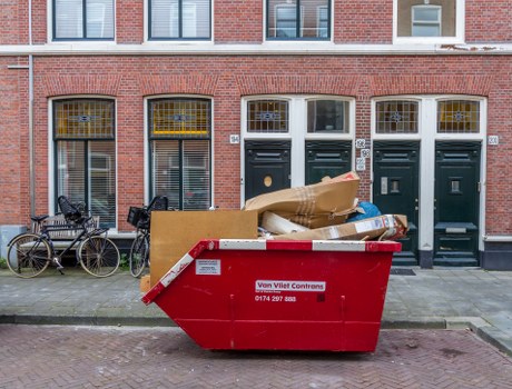 Construction site with waste materials being cleared